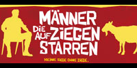 M�nner, die auf Ziegen starren